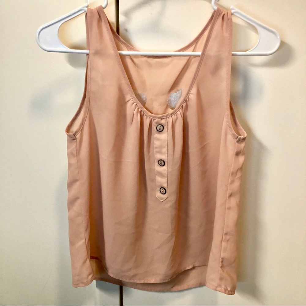 Silky sleeveless shirt with heart shape cuts